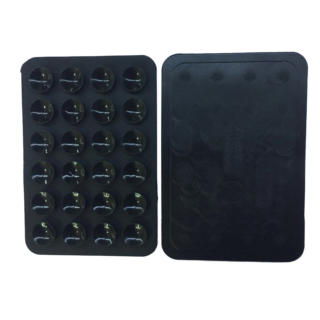 Black silicone suction grip pad shown from the suction side and smooth back.